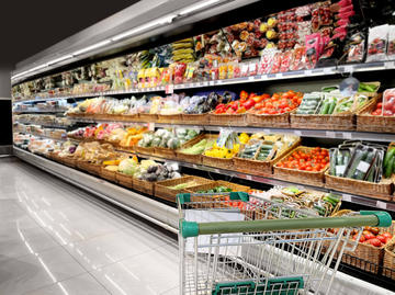 Adobestock A vegetable grocery aisle with an empty trolley in the bottom right